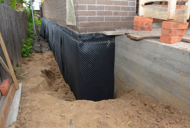 SJ Waterproofing Pros technician performing targeted Emergency Waterproofing assessment in Galena, KS